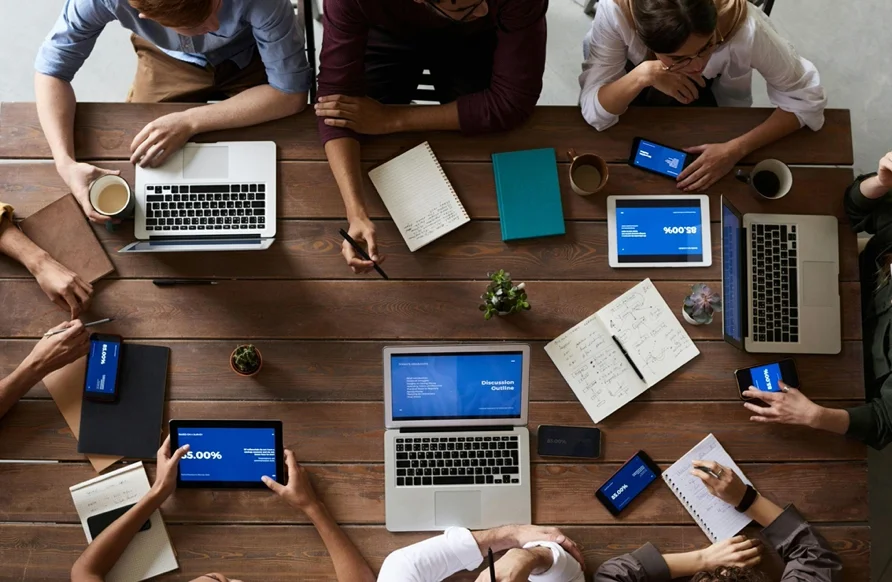 people working at a table